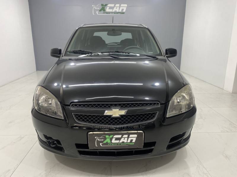 CHEVROLET - CELTA 1.0 MPFI VHC 8V GASOLINA 4P MANUAL - 2012/2013 - Preta - R$ 34.900,00