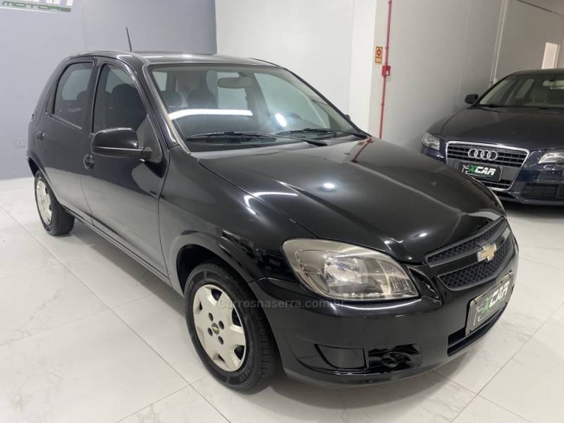 CHEVROLET - CELTA 1.0 MPFI VHC 8V GASOLINA 4P MANUAL - 2012/2013 - Preta - R$ 34.900,00