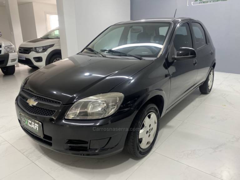 CHEVROLET - CELTA 1.0 MPFI VHC 8V GASOLINA 4P MANUAL - 2012/2013 - Preta - R$ 34.900,00