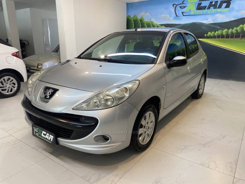 PEUGEOT - 207 1.4 XR SPORT 8V FLEX 4P MANUAL - 2009/2010 - Prata - R$ 23.900,00